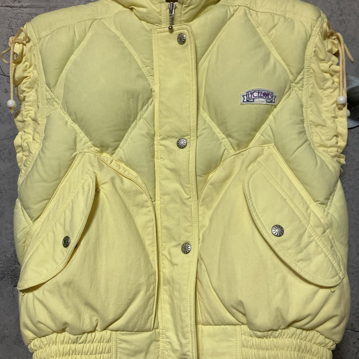 goose down vest sleeveless light yellow purple lycéenne by goldwin 