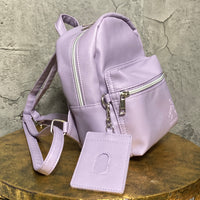 purple backpack with pass holder