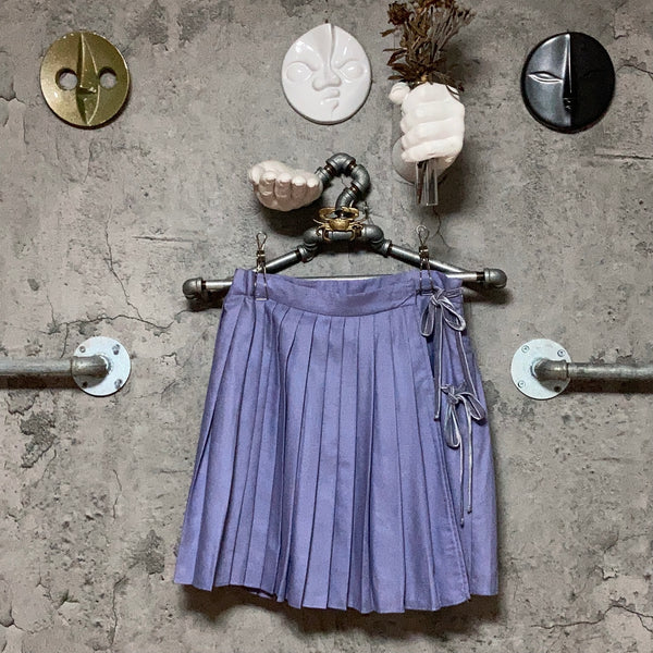purple pleated skirt