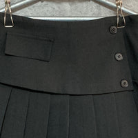 black pleated mini skirt