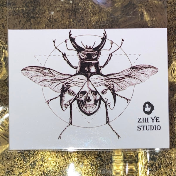 Vitruvian Man stag beetle scull tattoo sticker