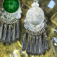 silver vietnam tribal piercings green