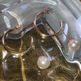 gold pearl hoop piercings