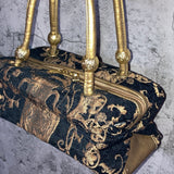 arabesque embroidered handbag black gold
