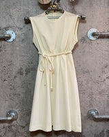 cream colored dress sleeveless