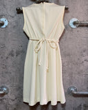 cream colored dress sleeveless