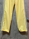 nylon track pants lemon yellow