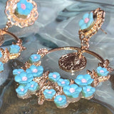 gold x blue floral piercings